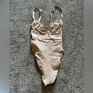 Skims Seamless Sculpting Thong Bodysuit in Clay